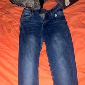 Distressed Blue Jeans